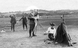 black and white photo of atkinson with instruments in the field