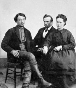 young man and two others in old black and white photo